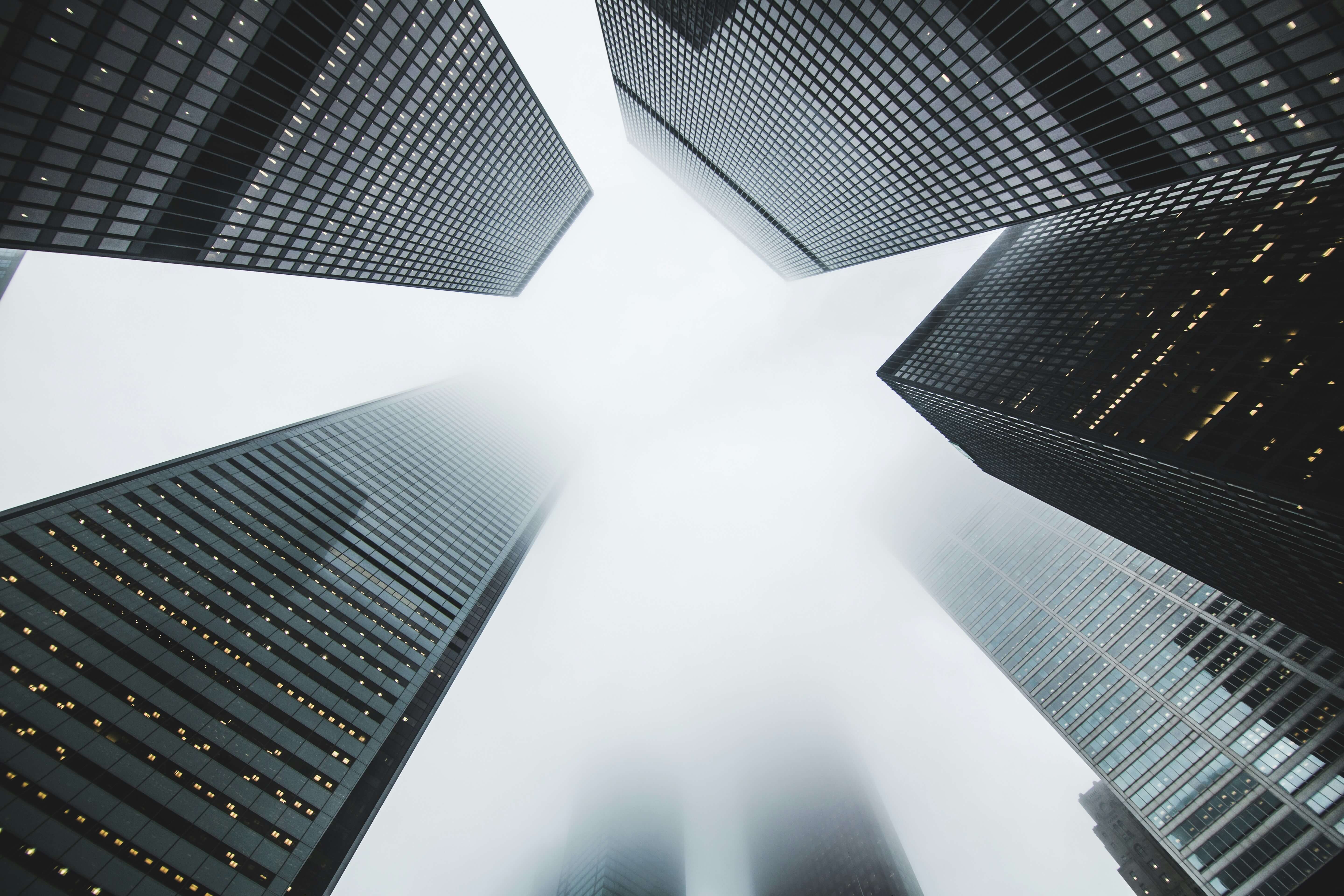 Skyscrapers rising into the fog