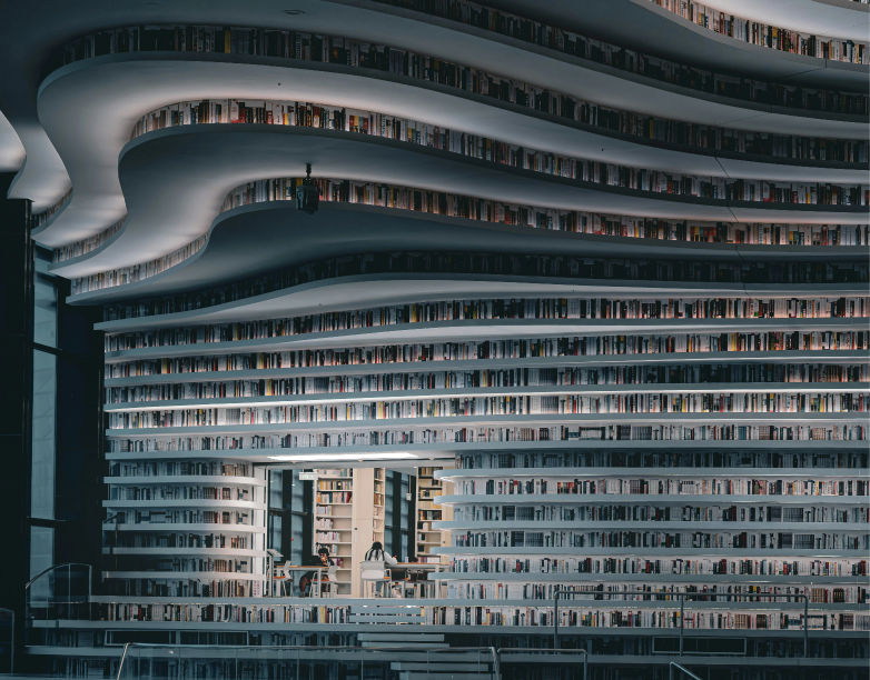 Modern library interior with curved bookshelves